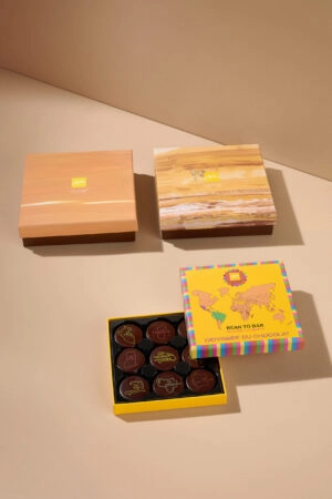 Boîte écrin personnalisée pour chocolats, un emballage élégant et sur-mesure qui valorise vos créations.