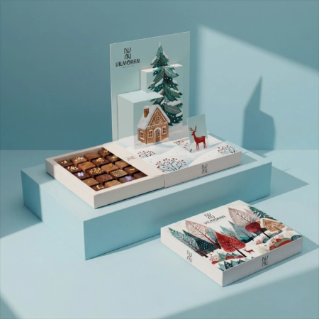 Boîte pop-up personnalisée élégante dévoilant des chocolats et douceurs avec originalité.
