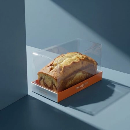 Boîte cake transparente personnalisée mettant en valeur un gâteau avec élégance et protection.