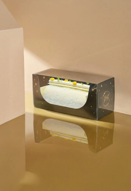 Boîte bûche Prestige transparente personnalisée, idéale pour sublimer et transporter vos bûches.