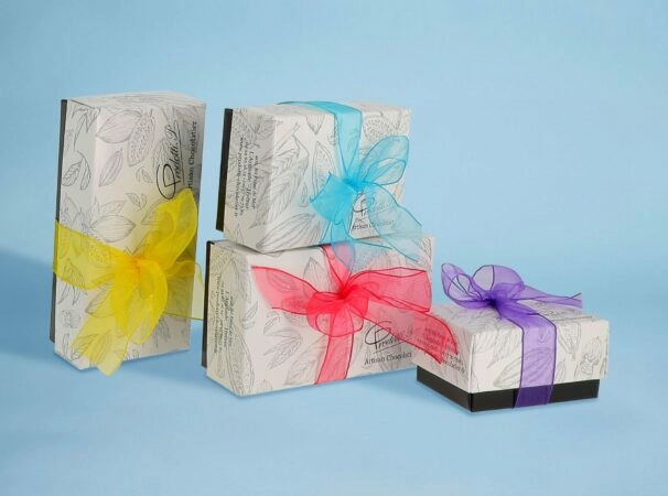 Boîte Balloboîte personnalisée pour chocolats, avec options de couleurs, finitions et logo, emballage élégant valorisant la marque.
