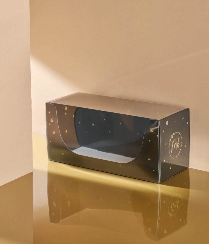 Boîte bûche Prestige transparente personnalisée, idéale pour sublimer et transporter vos bûches.