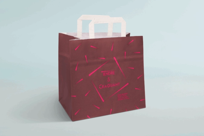 Sac en papier personnalisé avec poignée plate, idéal pour emballer et transporter des produits artisanaux sucrés ou salés, avec impression de logo et design de marque.