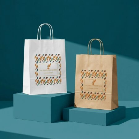 Sac en papier personnalisé avec poignée ficelle, idéal pour le conditionnement de chocolats, confiseries, produits salés ou sucrés, avec logo et visuel de marque imprimés.