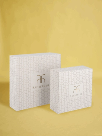 Boîte pâtissière personnalisée – emballage élégant et protecteur pour pâtisseries et desserts raffinés.