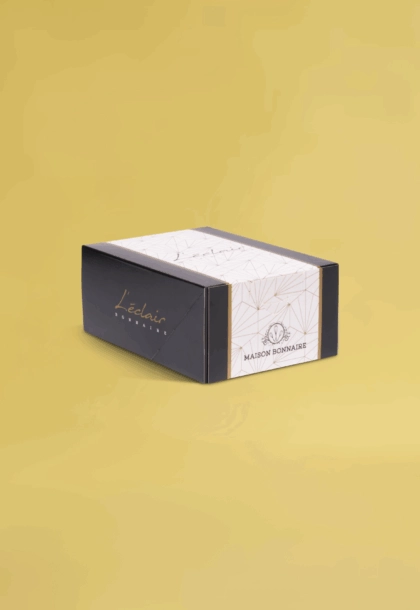 Boîte personnalisée pour éclair, conçue pour le transport et la présentation soignée de vos pâtisseries.