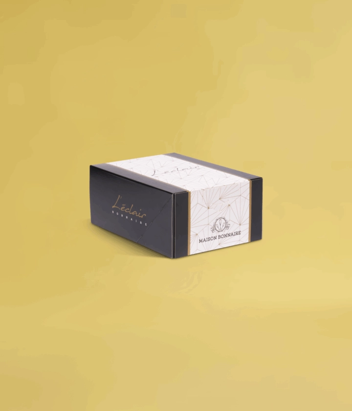 Boîte personnalisée pour éclair, conçue pour le transport et la présentation soignée de vos pâtisseries.